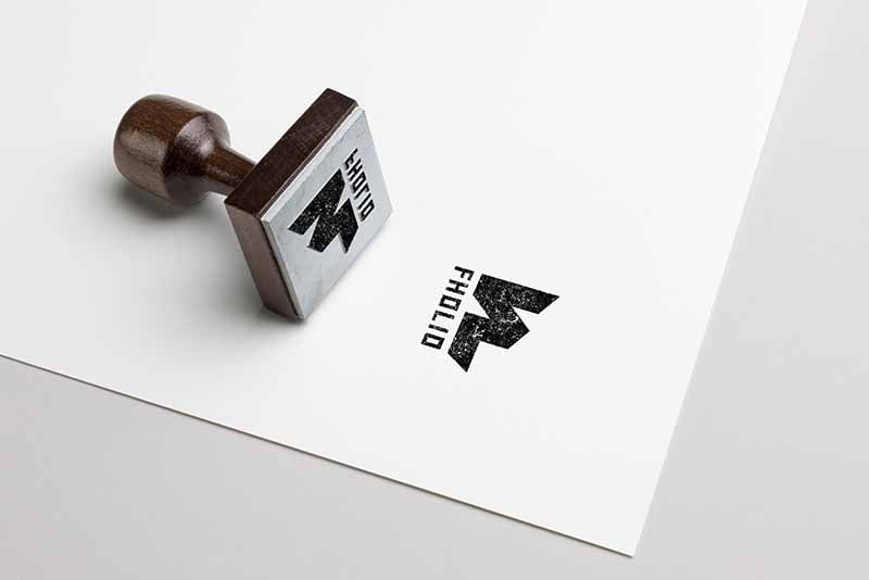 Logo Fholio en sello papel estampado